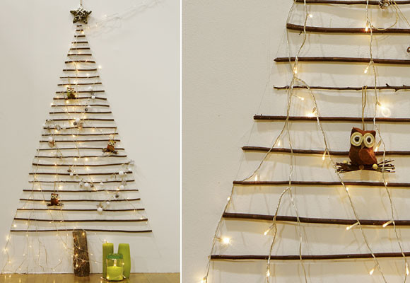 Un árbol de ramitas sobre la pared